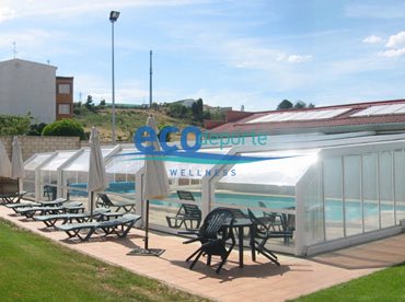 Cubierta acristalada lacada en blanco para piscina exterior Cerramiento acristalado en Madrid